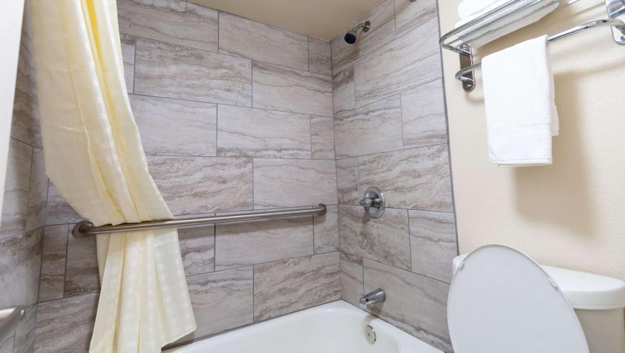 Magnuson Extended Stay And Suites Airport Hotel Irving Extérieur photo