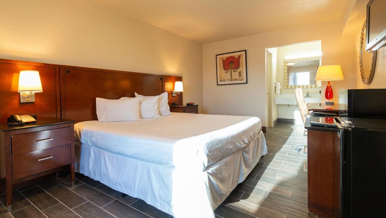 Magnuson Extended Stay And Suites Airport Hotel Irving Extérieur photo
