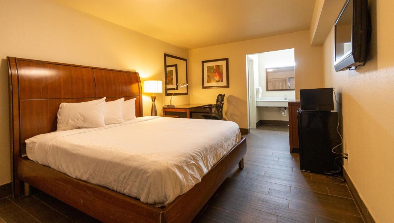 Magnuson Extended Stay And Suites Airport Hotel Irving Extérieur photo